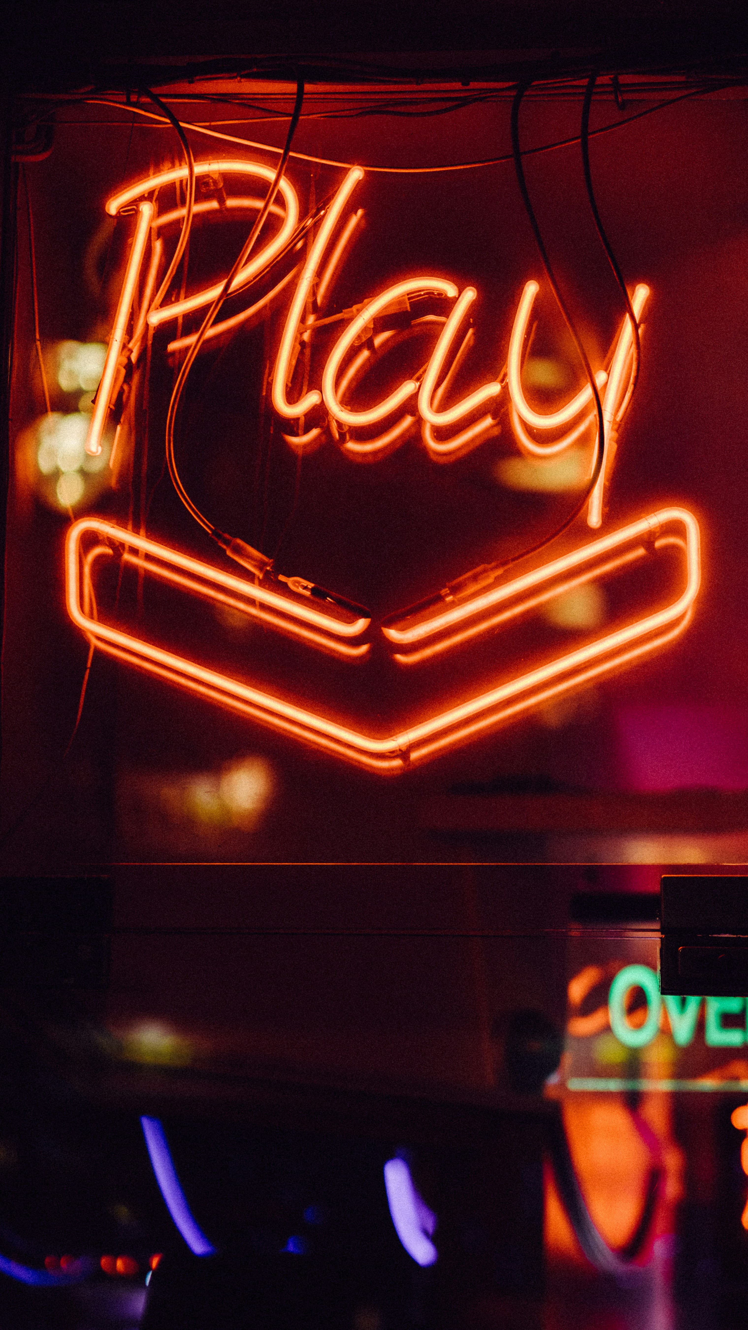 Neon sign saying Play